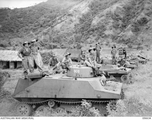Captured Type 2 Ka-Mi tanks at Rabaul without flotation pods, after the Japanese surrender. 14 Sep 1945. near Lakunai airstrip/Rabaul, New Britain. AWM caption notes multiple captured vehicles guarded by 37/52 Infantry Battalion.