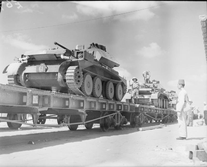 A13 Cruiser Mk IV tanks being unloaded at an Egyptian quayside onto railway trucks, 5 October 1940.