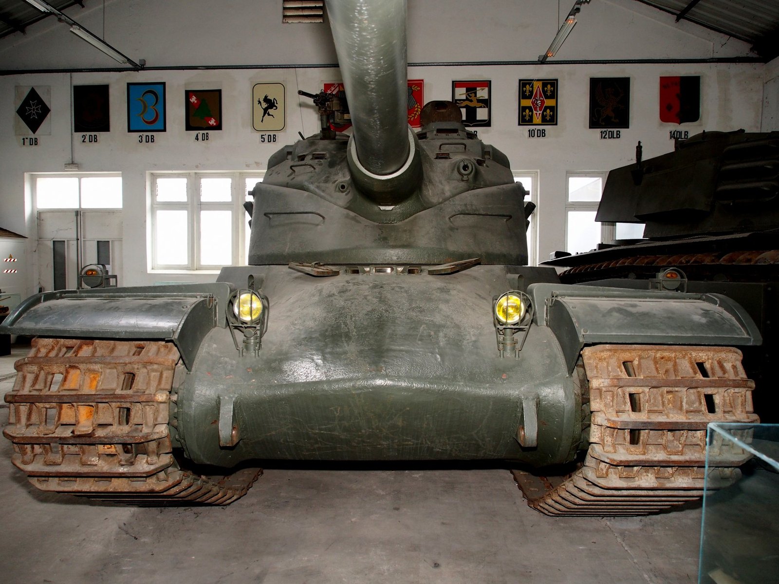 AMX 50/120 Surbaissé, frontal view showing broad tracks, cast front form, and oscillating turret, Musée des Blindés, Saumur, France. preserved AMX-50 Surbaissé prototype; date photographed 11 September 2013; photographer Alf van Beem; source Wikimedia Commons. frontal museum view; not combat or unit service. [IMG2].