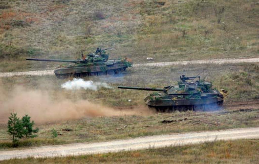 Live firing with M-84 and M55 S1 tanks, October 2008. not specified on file page. Mixed-vehicle exercise image; use with caution if isolating exact variant.