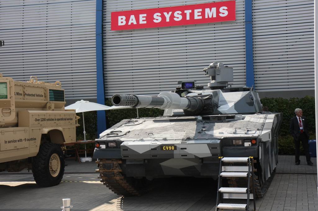 CV90120 front view at International Defence Industry Exhibition 2009. CV90120 on display with BAE Systems signage, emphasizing the compact turret and 120 mm main gun installation on a CV90 hull. 31 August 2009. International Defence Industry Exhibition 2009, likely Kielce, Poland (event context). Event/location inferred from Commons page category and file title.