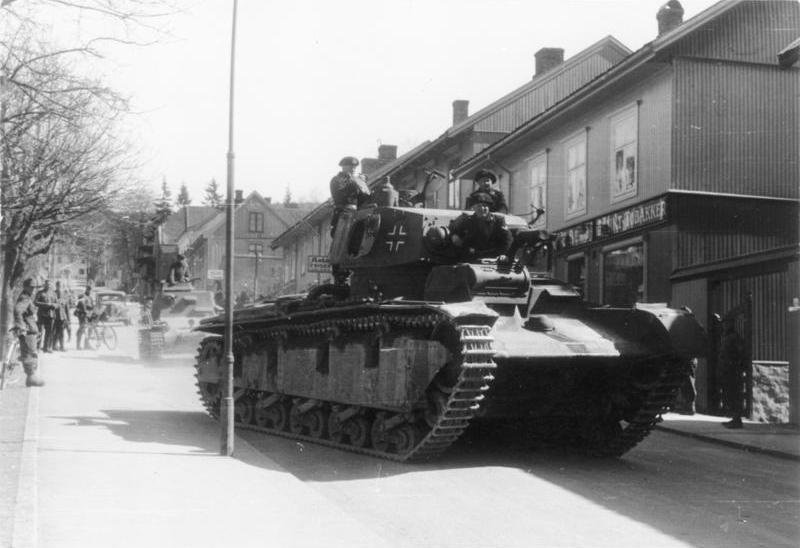Neubaufahrzeug in a Norwegian settlement during the1940campaign.