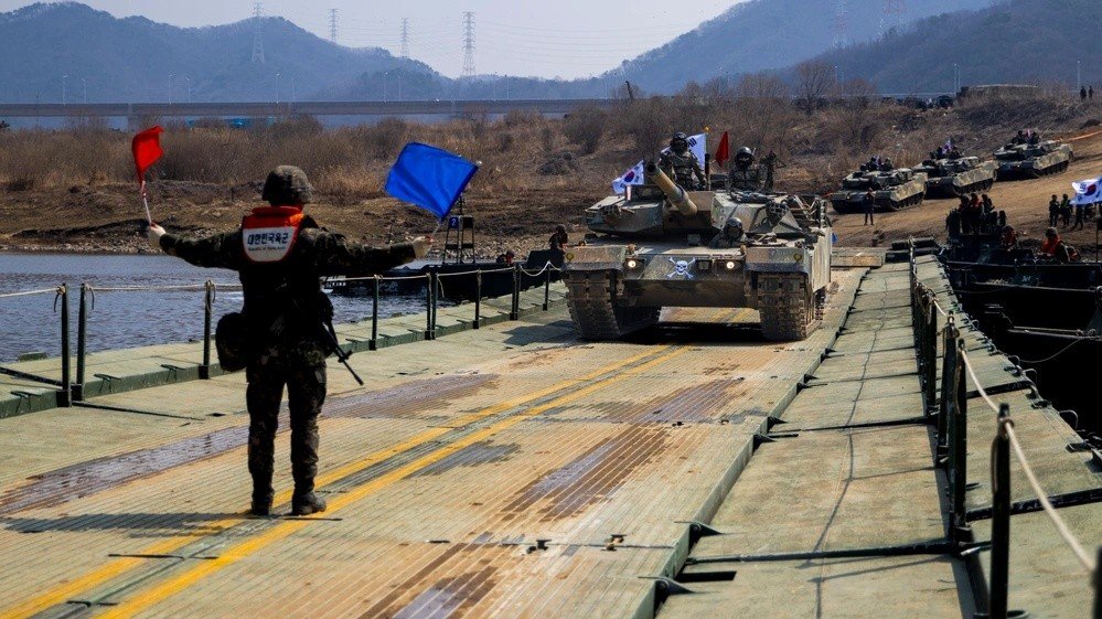 K1A2 tank crosses a U.S. Army Improved Ribbon Bridge during Freedom Shield 25 joint wet-gap training at Yeoncheon-gun, Gyeonggi-do, South Korea, 19 March 2025. current service image illustrating K1A2 in combined ROK-U.S. engineer training.