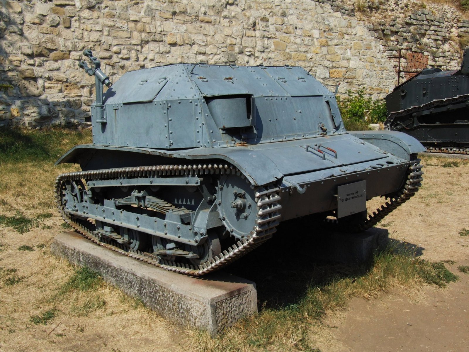 Tankette identified by the source as a TKF at the Belgrade Military Museum in August 2012; modern restoration context applies.