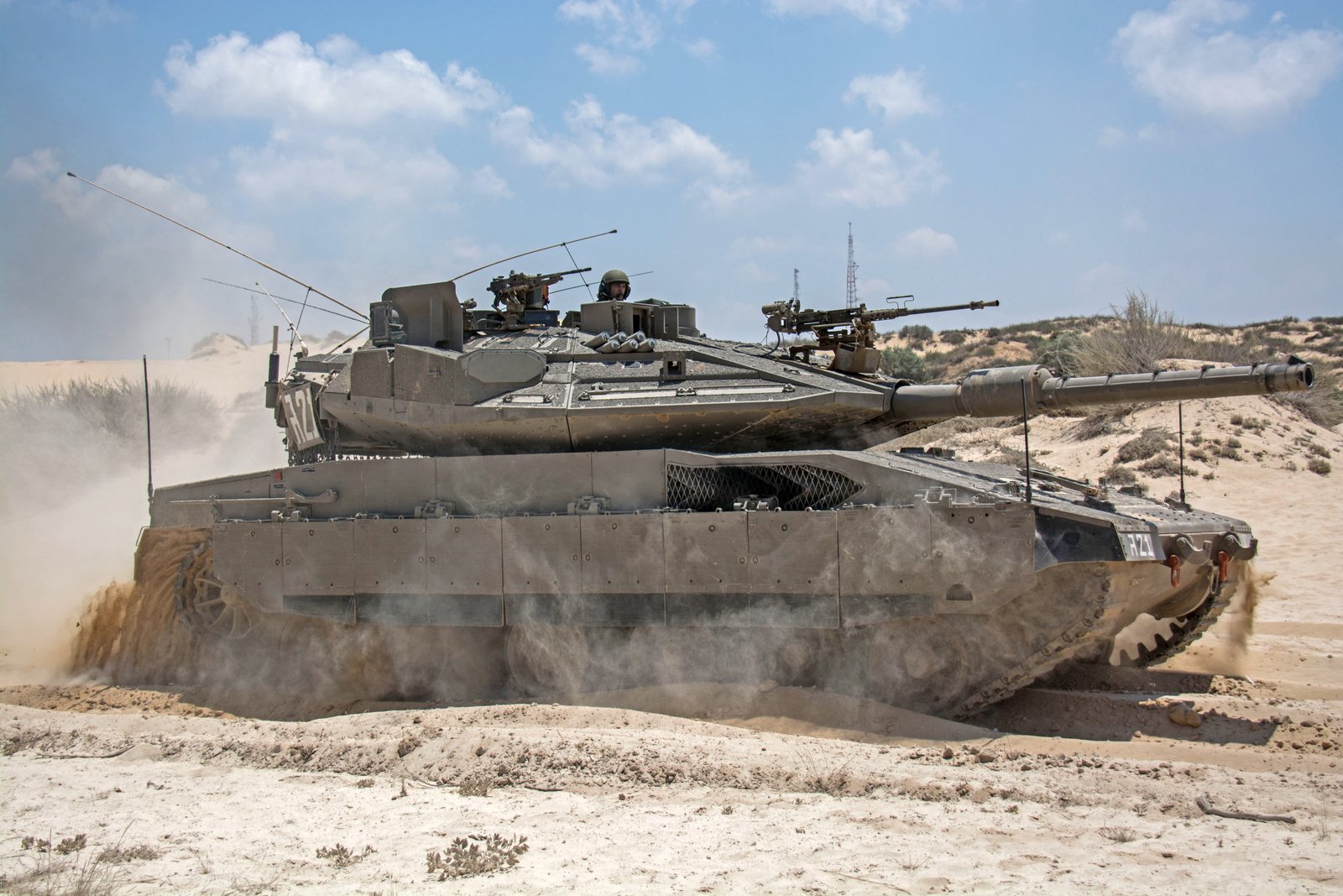 Merkava Mk 4M Windbreaker with Trophy active protection during Operation Protective Edge. 20 July 2014. Gaza border / Operation Protective Edge context. clear side-view APS-era image.