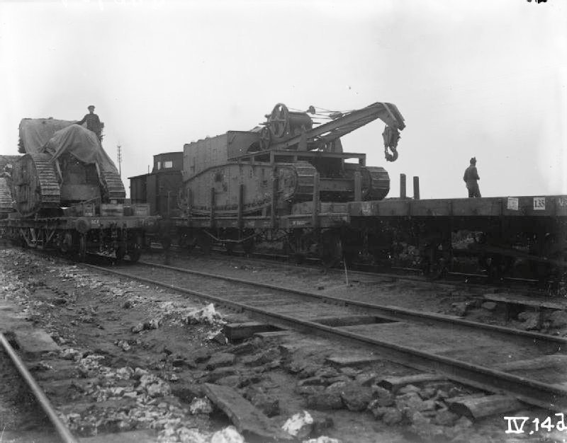 Gun Carrier Mark I salvage vehicles with crane equipment on railway flats at Plateau Station before Cambrai, November 1917; Imperial War Museums Q 46934.