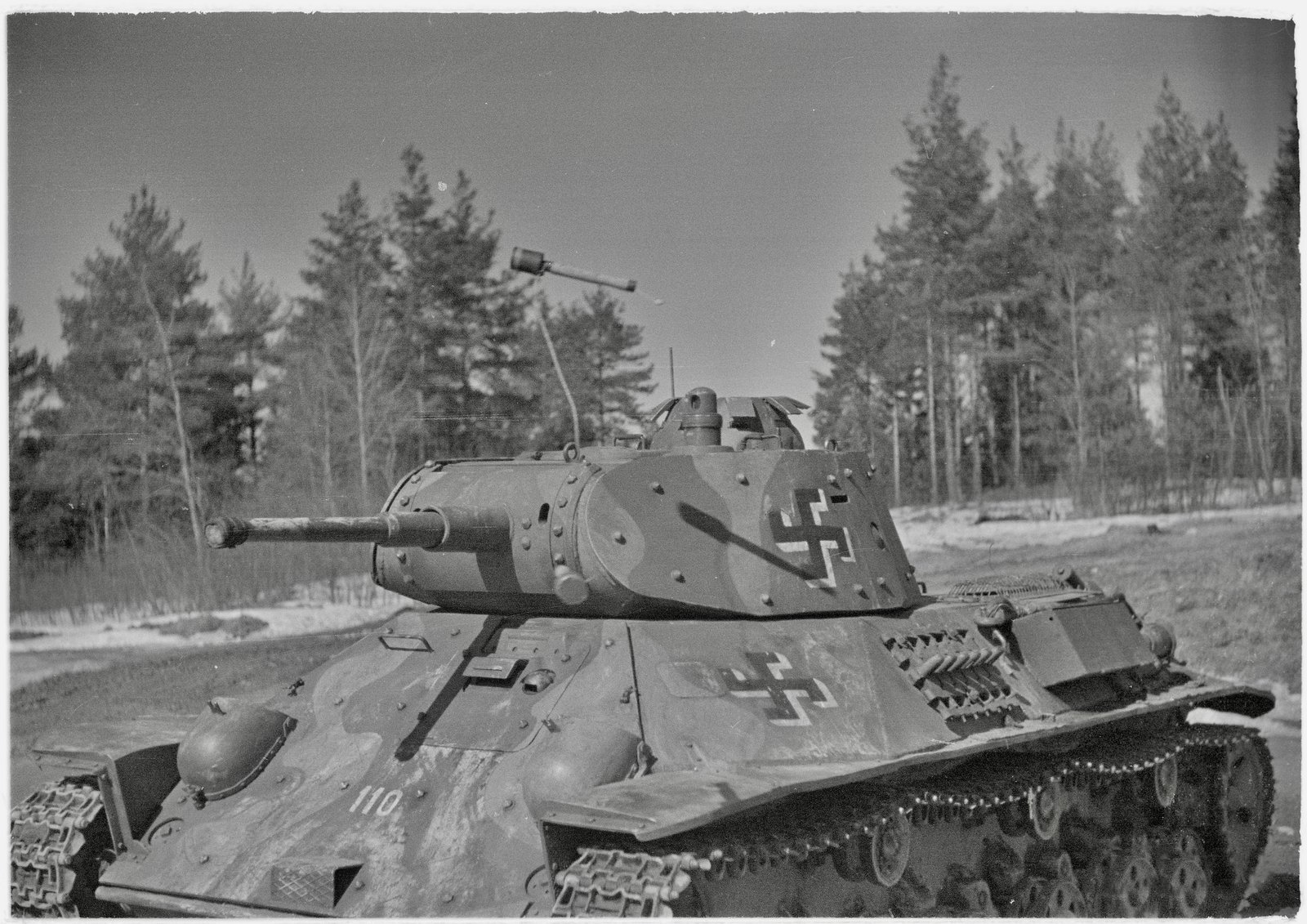 Finnish wartime training/test photograph involving a captured T-50 and anti-tank grenade/smoke-grenade technique, Enso, 20 April 1944. Included for service-context value rather than as a clean technical identification view.
