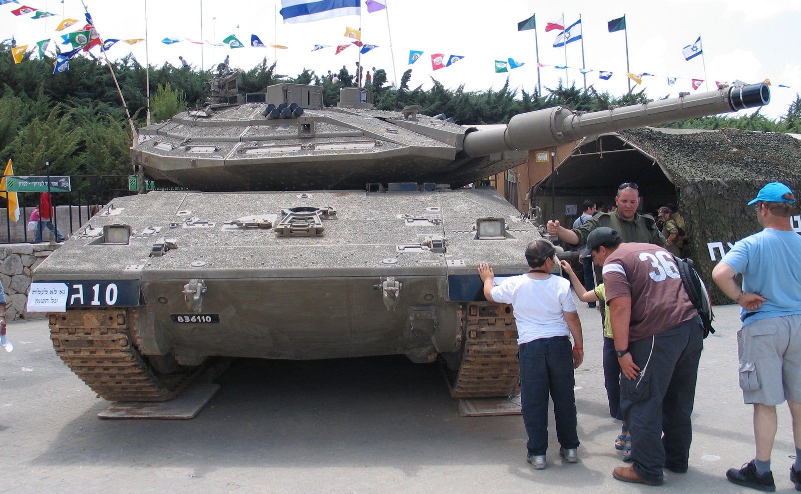 Merkava 4 MBT at Independence Day exhibition, Yad La-Shiryon Museum, Latrun, Israel, photographed 3 May 2006. exhibition setting with visitors; vehicle configuration may not represent combat fit.