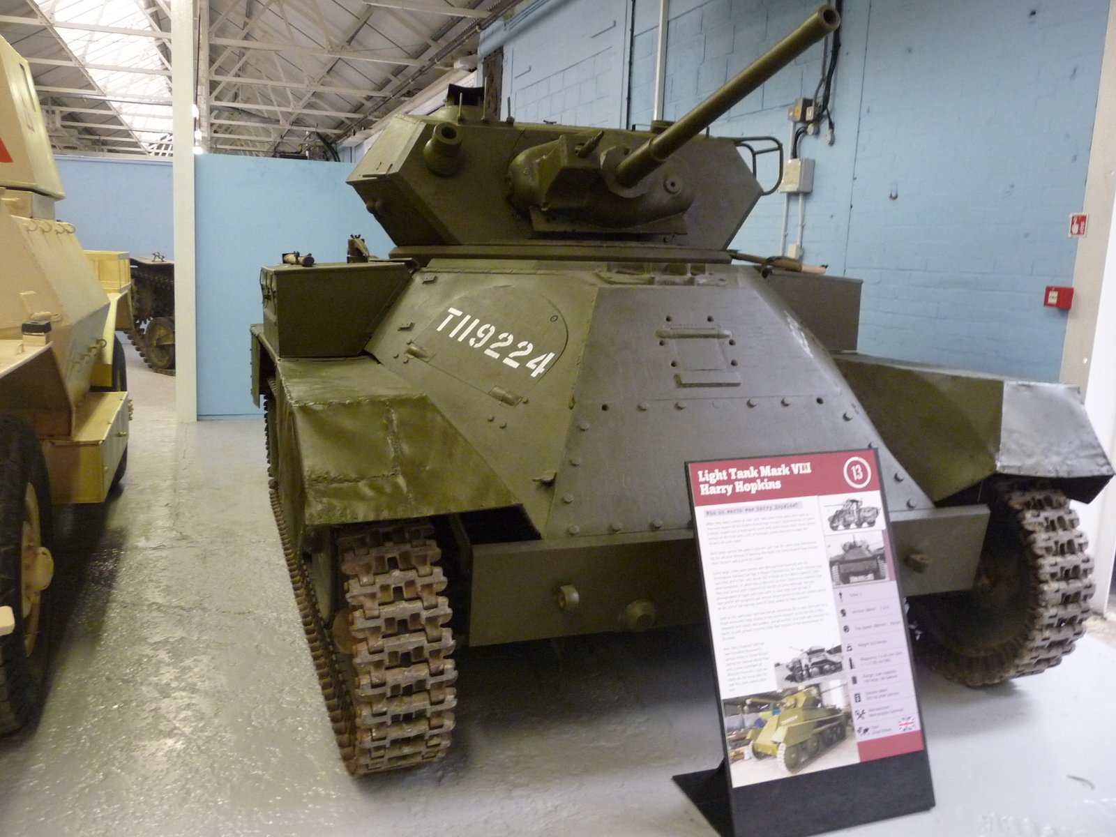 Rear-quarter museum view of Tank Light, Mark VIII A25, Harry Hopkins T119224 at Bovington, Shows engine-deck, rear-hull, and suspension details. Vehicle / variant identification: Tank Light, Mark VIII A25, Harry Hopkins T119224. Date /. 18 April 2010, Bovington Tank Museum, United Kingdom. Source /. Museum survivor; Shows rear and top surfaces. The visible finish reflects restoration/display condition, not necessarily wartime paint or stowage.