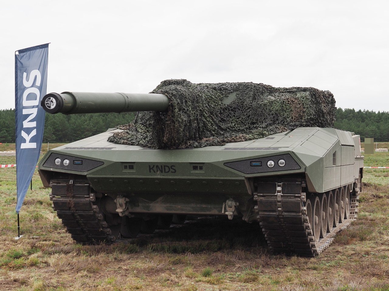 KNDS Leopard 2 A-RC3.0 test vehicle PT02, front view, on static display during Open Day at Klietz training area 2025. 26 July 2025. Klietz / Schonhauserdamm auxiliary airfield, Brandenburg, Germany. static display/test vehicle; no operator service implied. [Commons Front 2025].