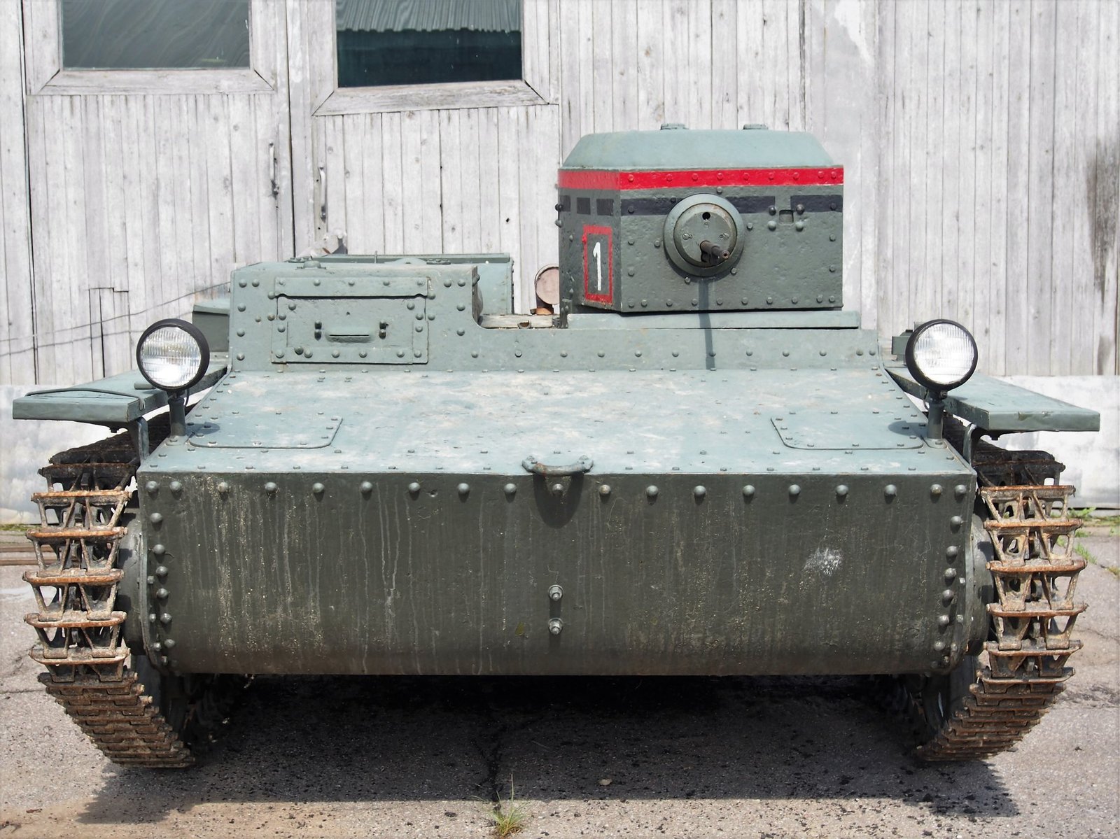 Front view of the T-38 museum vehicle, including both tracks and the offset turret.