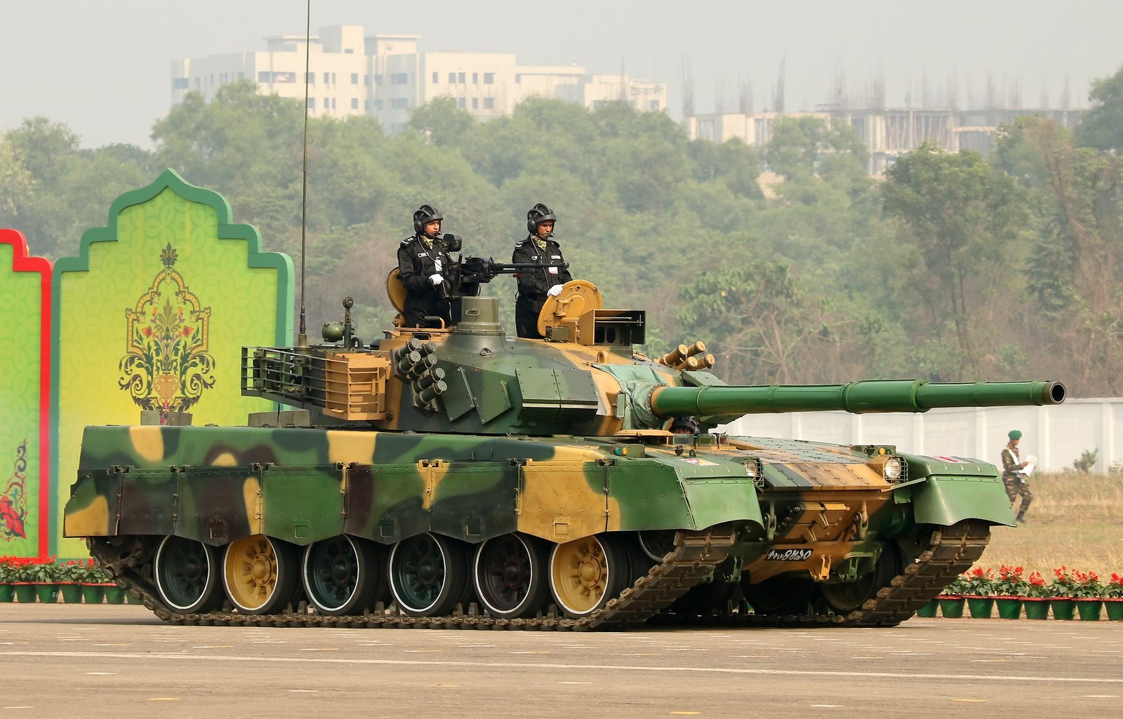 Bangladesh Army MBT-2000 at a 2017 parade setting, Tejgaon Airport / Victory Day parade context. 15 December 2017. visible operator markings and parade configuration; Shows export-branch comparison.