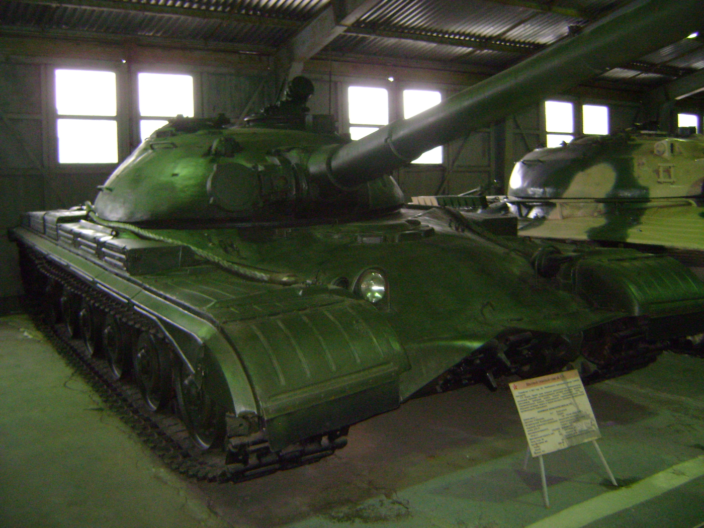 Object 770 in Kubinka Tank Museum, older indoor-display photograph. Object 770 prototype. 1 September 2013. Kubinka Tank Museum. Source/. shows pre-2024 exhibit condition and side/front geometry; adjacent vehicle partially visible. [S5].