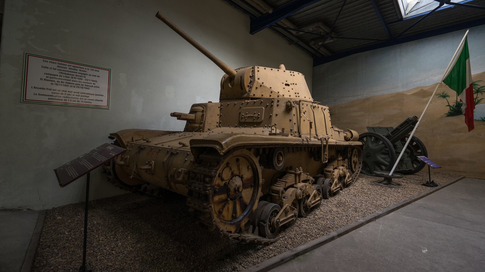Restored M15/42 in Italian camouflage, photographed in 2015. The vehicle is Shows color presentation and hull/turret geometry, but the finish is a modern restoration and is not established as a verified wartime scheme without independent paint evidence. Restoration photograph; Shows visual orientation only.
