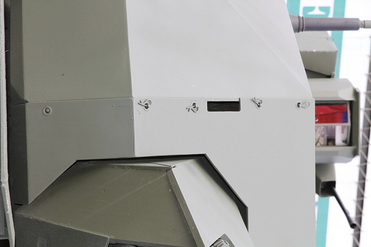 Close-up of T-14 turret/module features during an Armiya-2020 exhibition display, Russia, August 2020. Vehicle/variant identification: T-14 exhibition vehicle; exact subsystem identification is interpretive and not confirmed by the photo source. Source/.