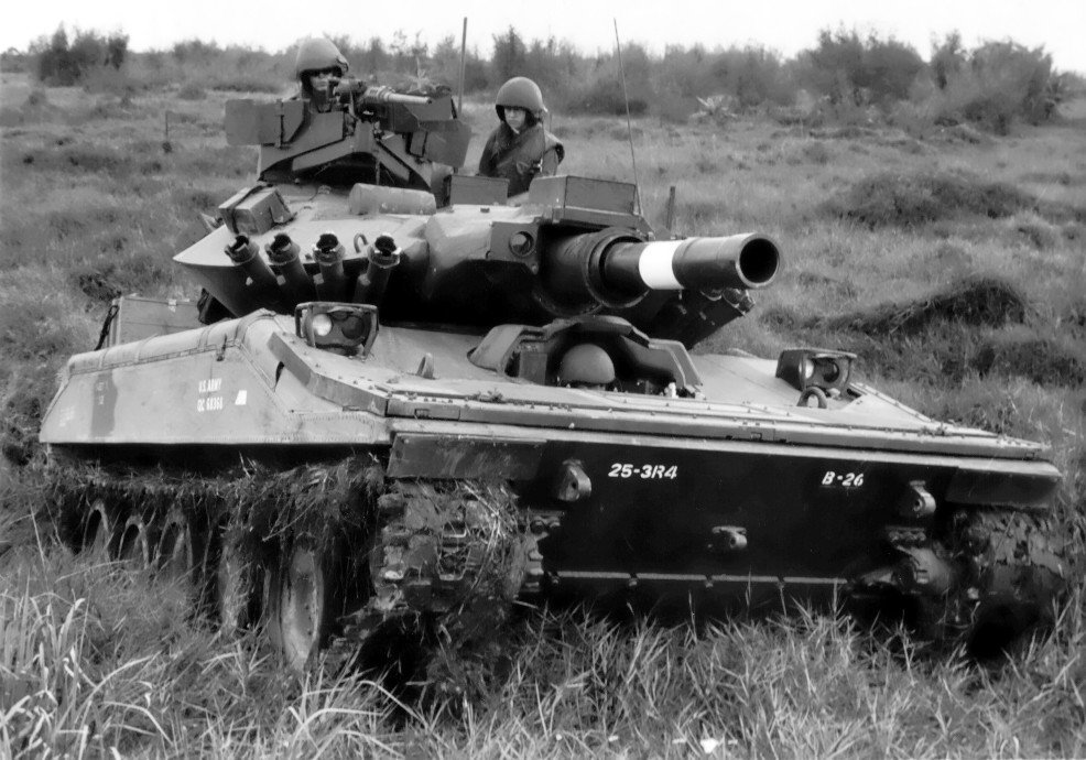 M551 Sheridan and crewmen of 3rd Squadron, 4th Cavalry in Vietnam, 1969. The image illustrates field-service stowage and the tank's use in cavalry support rather than missile-tank doctrine.