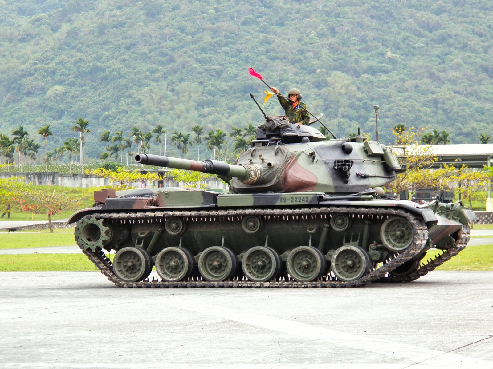 Republic of China Army M60A3 TTS during a turret-turning demonstration, 24 March 2012. The photograph shows the late baseline 105 mm gun/turret arrangement that Taiwan’s newer fire-control modernization reports build upon.