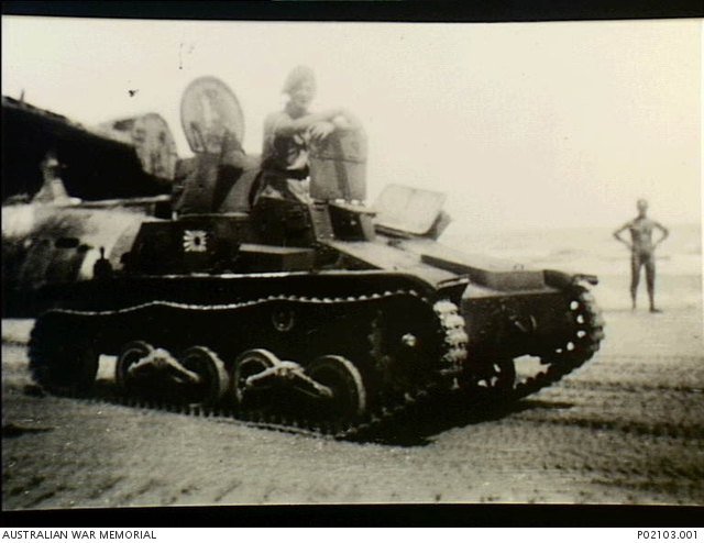 Brian Bourke sitting in the captured Type 94 tankette at Balikpapan, c. August 1945.